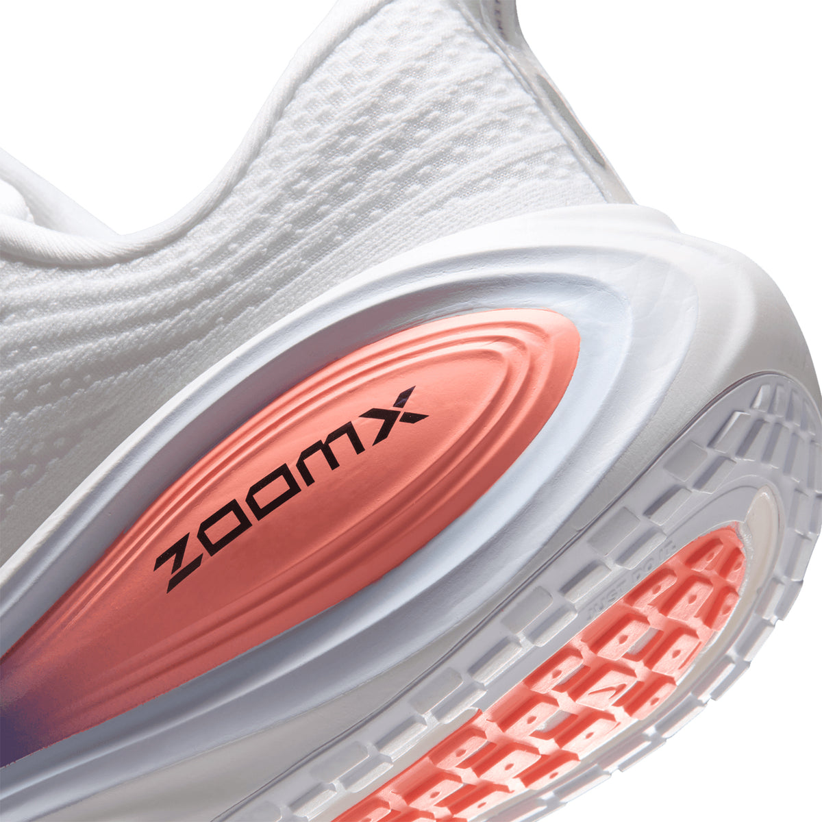 Men's Nike Vomero Plus Running Shoes White Atomic Pink Racer Blue Black angled side and heel view showing full-length ZoomX foam with high-abrasion outsole and soft breathable mesh upper for maximum cushioned everyday road running