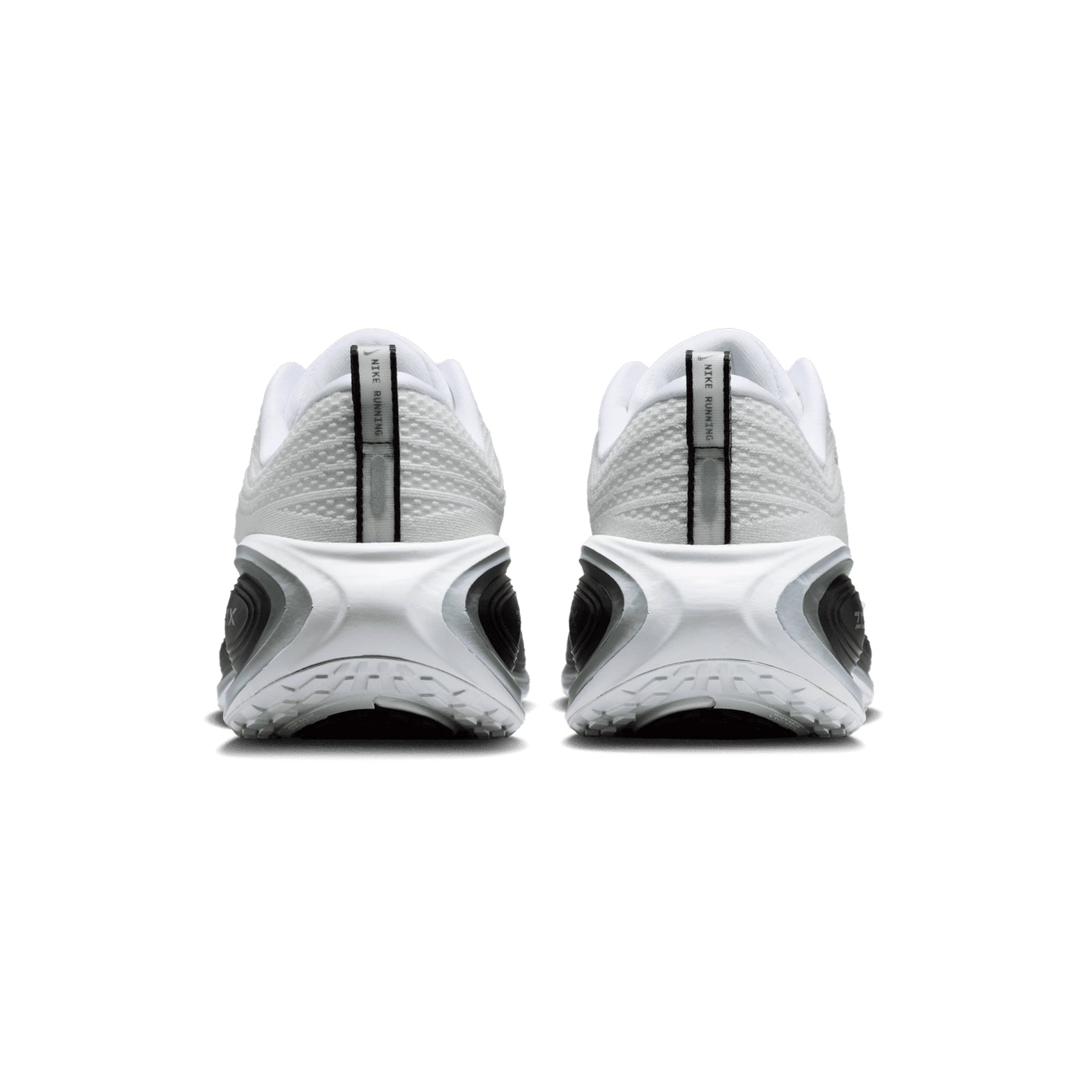 Nike Vomero Plus men's running shoe in White / Metallic Silver / Black — heel view showing padded collar construction, metallic silver heel detailing, reflective detail and full-length ZoomX foam midsole contrast