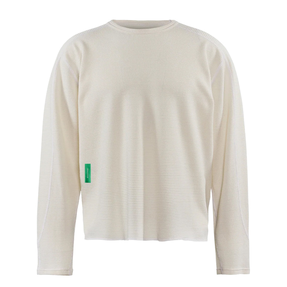 District Vision Men’s Waffle Top White in a long-sleeve waffle-knit crewneck cotton blend with a small green rectangular tag on the side.