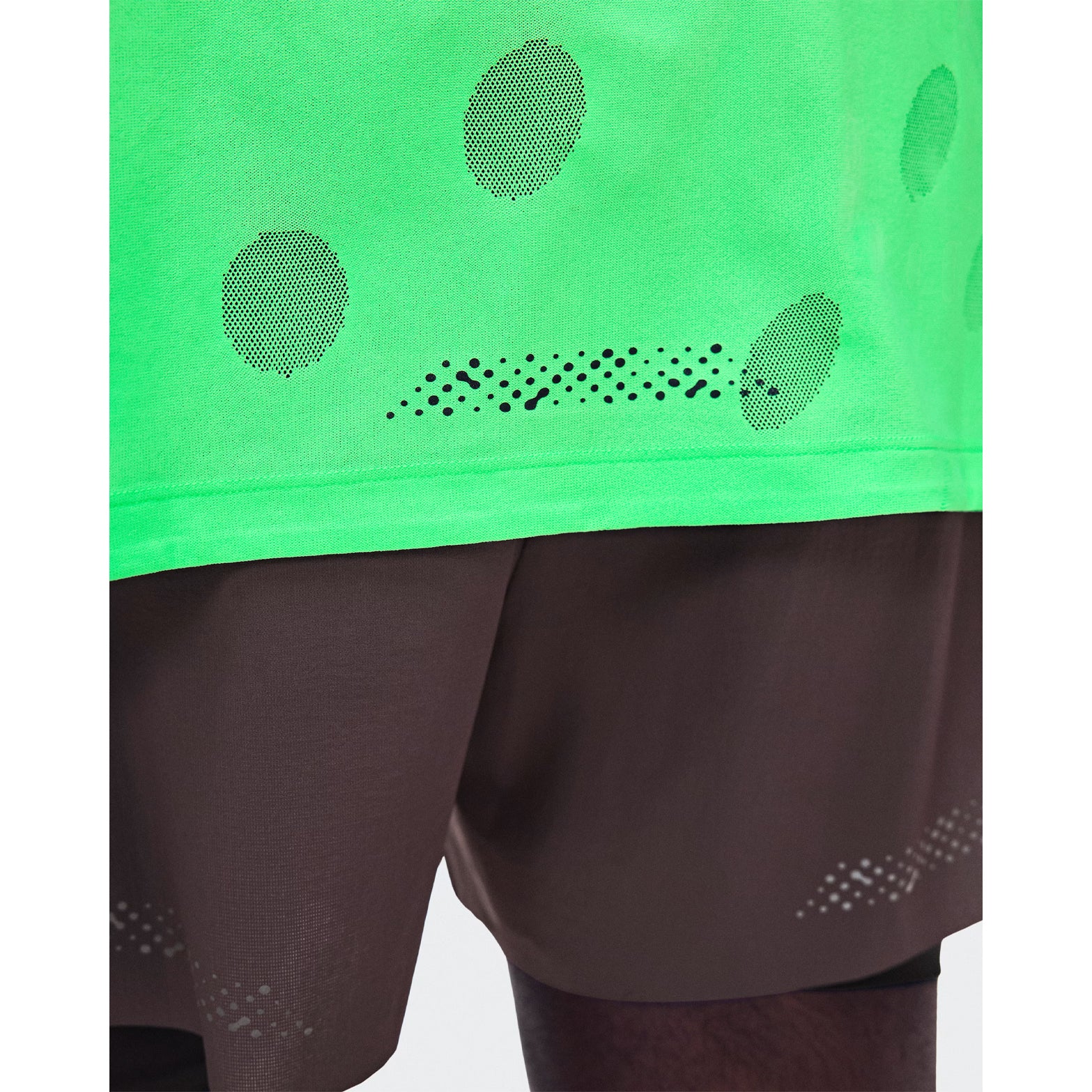 Men's On Zero-T Breathe Verdite close-up of distinctive functional jacquard fabric showing On DryTec breathable moisture-wicking construction for ultralight distraction-free training