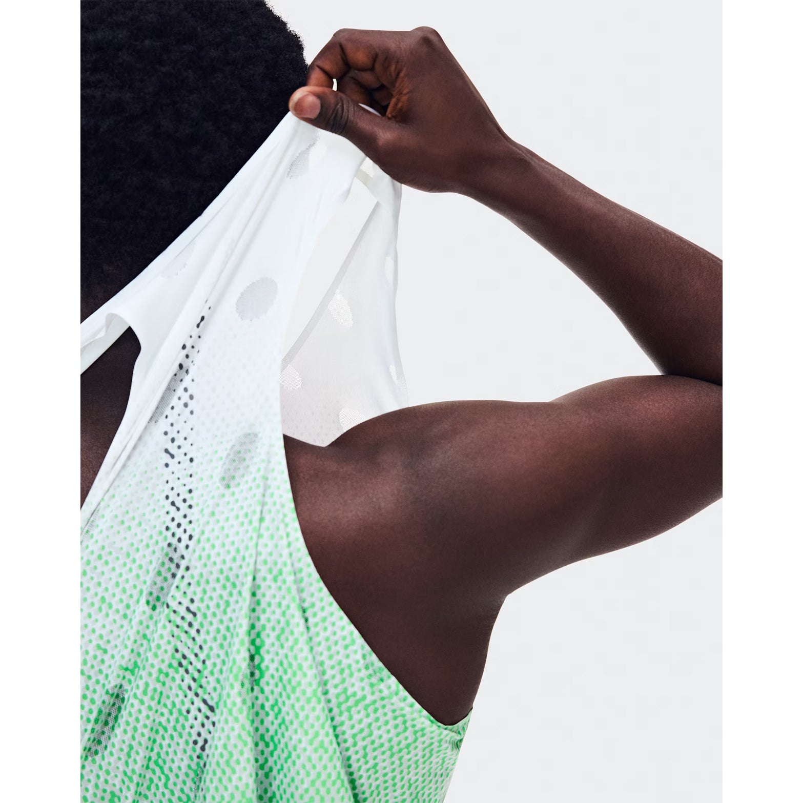 Men's On Zero Tank Breathe Verdite close-up of striking functional jacquard fabric showing On DryTec breathable moisture-wicking construction with minimal seams for ultralight distraction-free racing and training