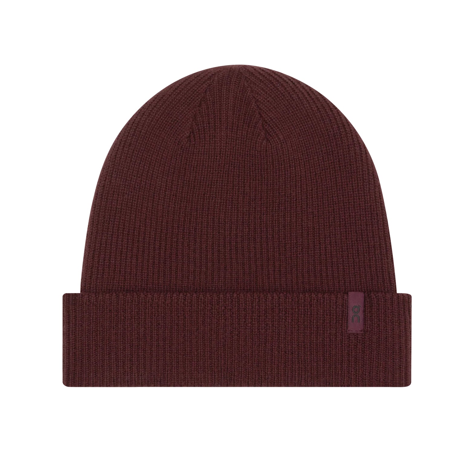 The Merino Beanie Maroon from On is crafted from merino wool and features a rich maroon color, folded brim, and a subtle rectangular side tag. Designed for outstanding temperature regulation, this beanie keeps you comfortable whether you’re running or exploring the city.