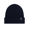 The Merino Beanie Midnight by On is a black knit beanie crafted from temperature-regulating Merino wool, featuring a folded brim and a small rectangular “oc” tag on the front—perfect for everyday wear or as your go-to running beanie.