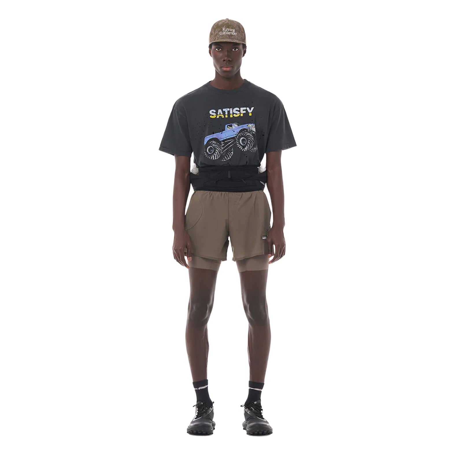 Satisfy MothTech Tee Aged Black full body front view on male runner showing soft weathered organic cotton with laser-cut hand-opened ventilation holes