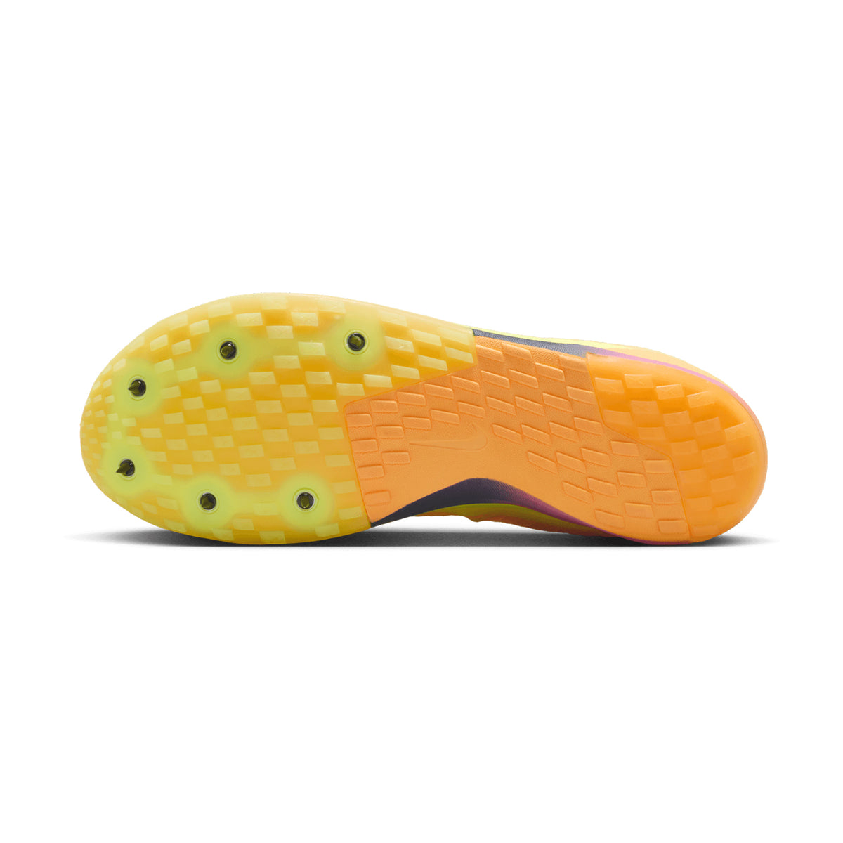 The image shows the Citron Pulse and Indigo Burst sole of the Nike Zoom Rival XC 7 running spikes, featuring small studs and a textured, grid-like pattern for traction reminiscent of cross-country spikes.