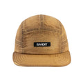 Bandit Nylon HumoFit Lunar Wash Run Hat Copal front view showing silky nylon construction with printed Bandit logo and branded taping detail