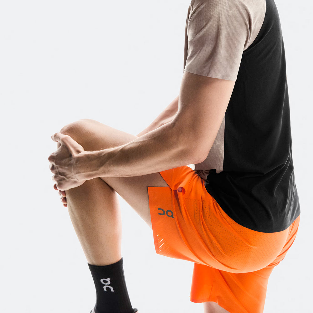 On Men's Performance 7 Inch Shorts Flame - achilles heel
