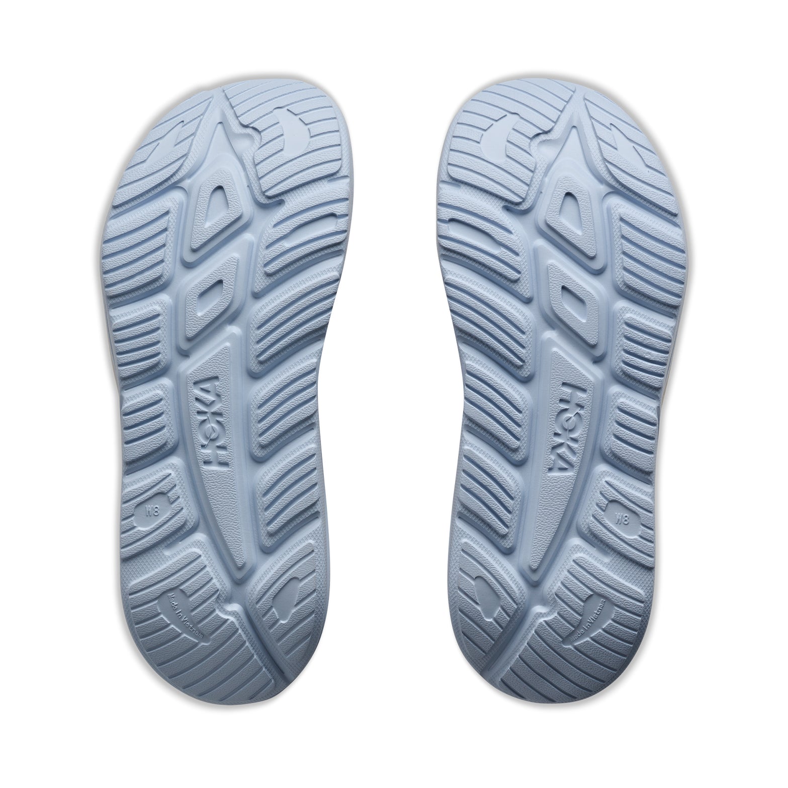 HOKA Ora Recovery Slide 3 Alabaster Ambient Blue sole view displaying injection-moulded EVA outsole for reliable grip on indoor and outdoor surfaces during recovery wear