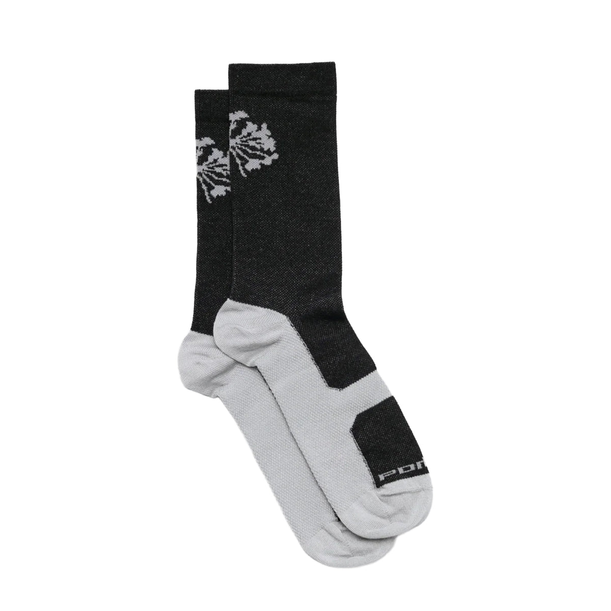 A pair of Portal Pattern Active Socks Black Beauty / Reflective featuring a black upper with a leaf pattern near the top and the word “PORSCHE” on the gray toe, designed for moisture control and all-day comfort.