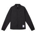 The Satisfy PeaceShell River Shirt Black is a lightweight, long-sleeve button-up shirt with a collar, dual chest pockets, and a small white label near the bottom hem. It offers wind protection and is inspired by classic utility designs.