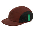 District Vision Performance Panelled Mesh Hat in Terracotta — front product shot showing 3-inch brim, recycled water-resistant shell construction and honeycomb mesh panel detail in terracotta colourway