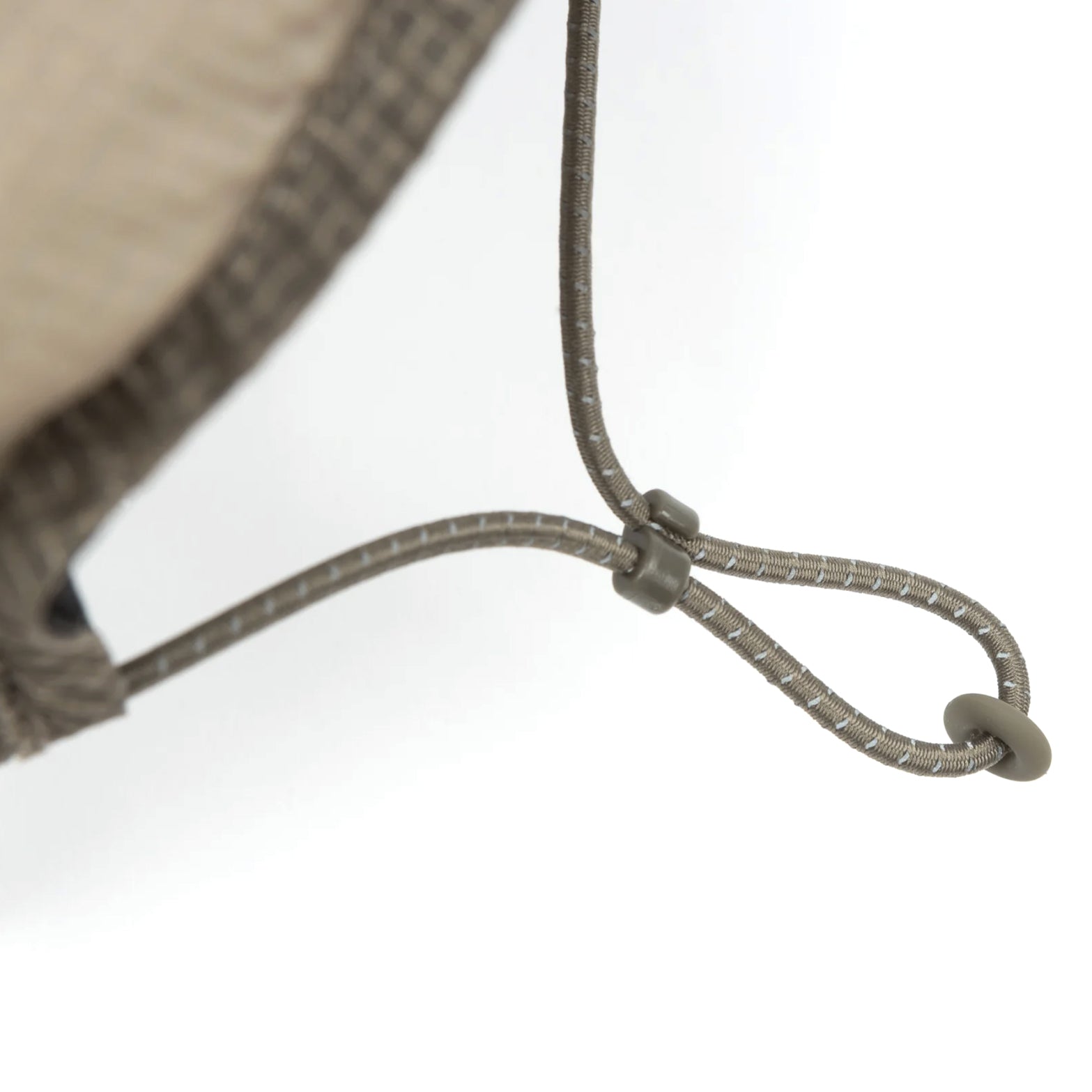 Satisfy Rippy Trail Cap Falcon close-up of adjustable bungee cord back strap showing reflective loops for personalised fit across elevation, descents and weather shifts during trail running