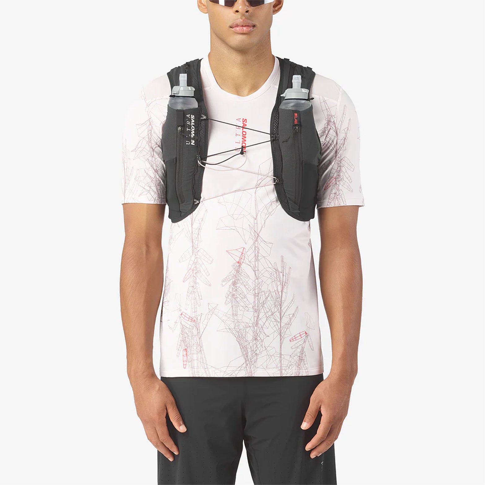 Salomon S/LAB Ultra 12 Set Running Vest Black front view on model showing seamless stretch fit and dual soft flask pouches