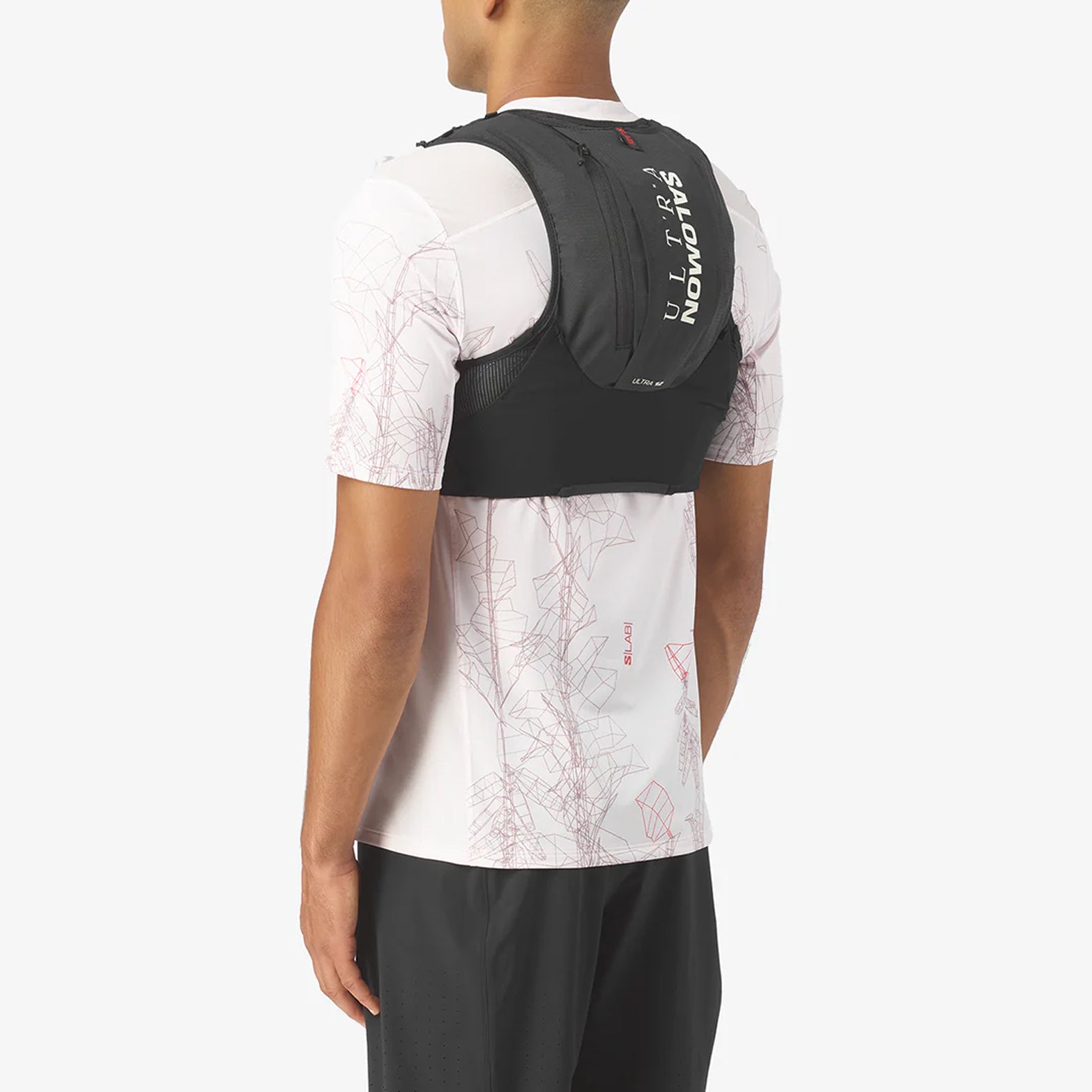 Salomon S/LAB Ultra 12 Set Running Vest Black back view on model showing Sensifit panel fit and 12L tunnel pocket storage