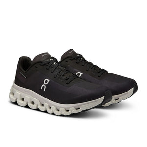On Women's Cloudflow 4 Running Shoes Black / White - achilles heel