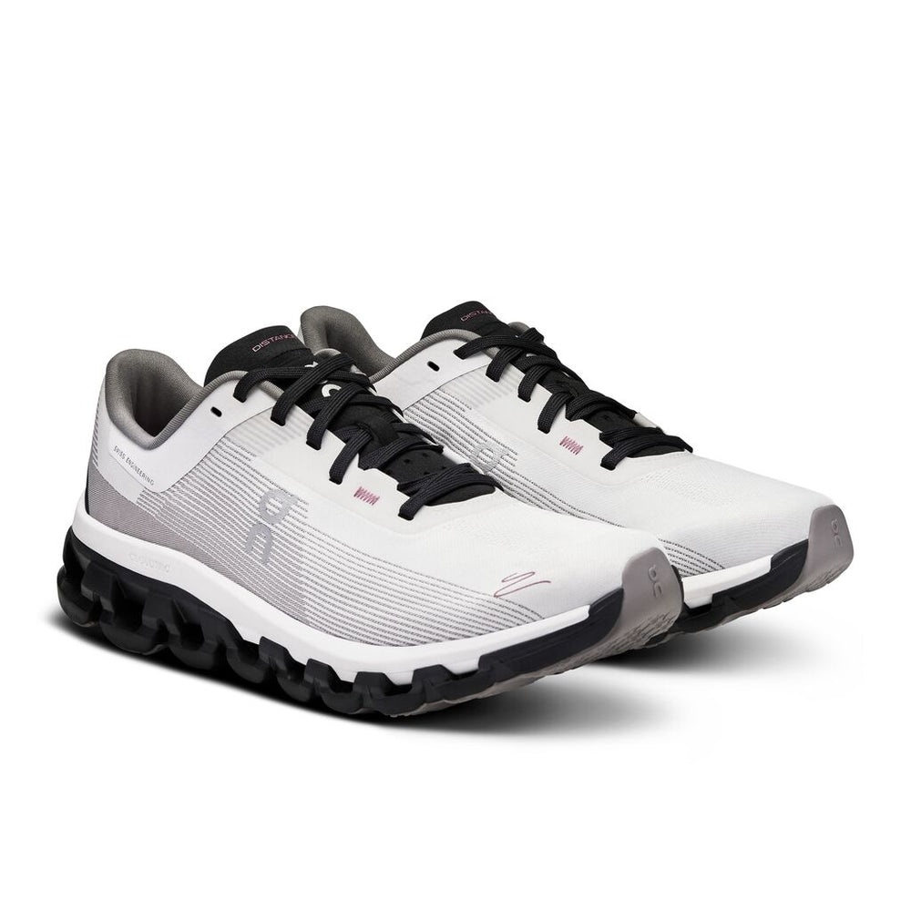 On Women's Cloudflow 4 DISTANCE Running Shoes White / Black - achilles heel
