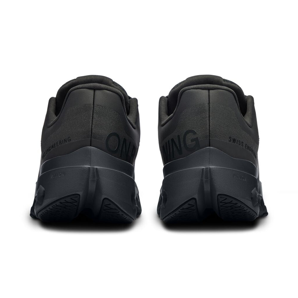 On Women's Cloudsurfer Next Running Shoes Black / Eclipse - achilles heel