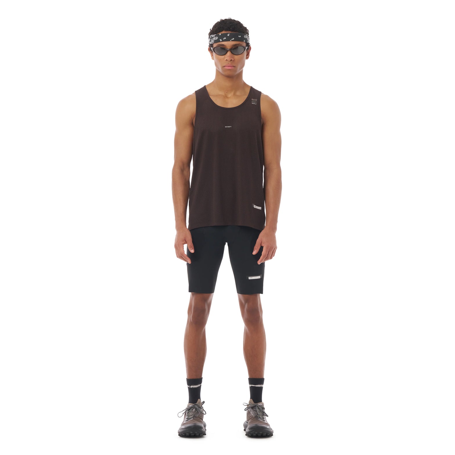 Satisfy Space-O™ Singlet in Deep Mahogany — front view worn on model showing race-cut fit, laser punch-out perforated shell and stealth-reflective Satisfy logo