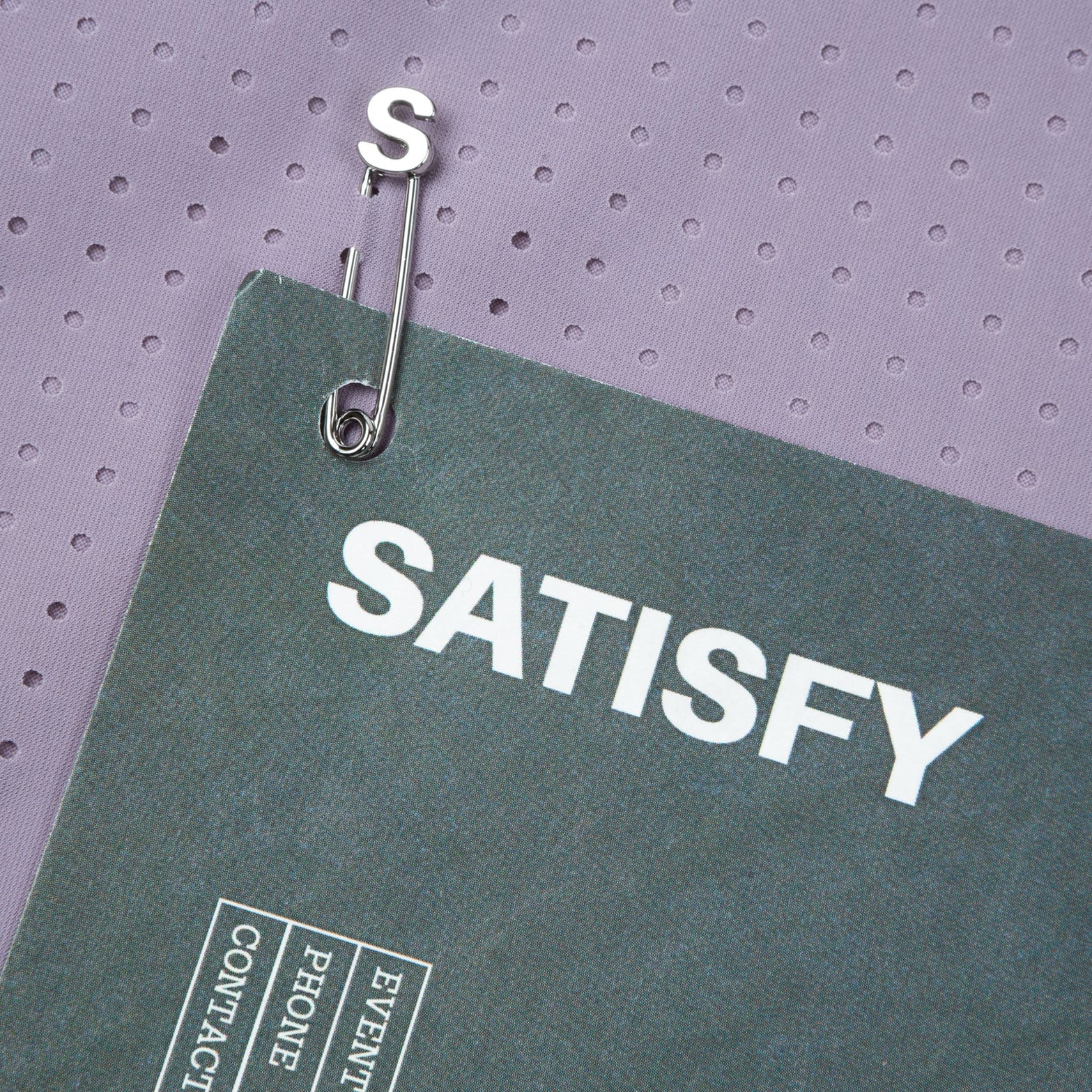 Satisfy Space-O™ Singlet in Dusk — closeup showing ©Satisfy S-Pins positioned through laser perforations for race-day bib fastening