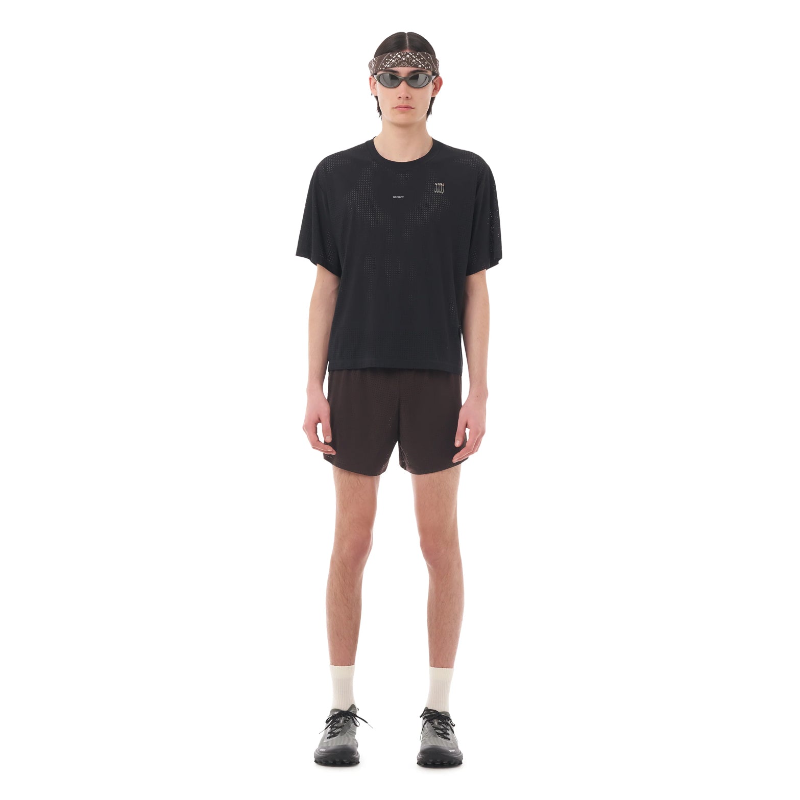 Satisfy Space-O Tee Black full body front view on male runner showing regular fit with precision-punched Space-O micro jersey and four-way stretch construction