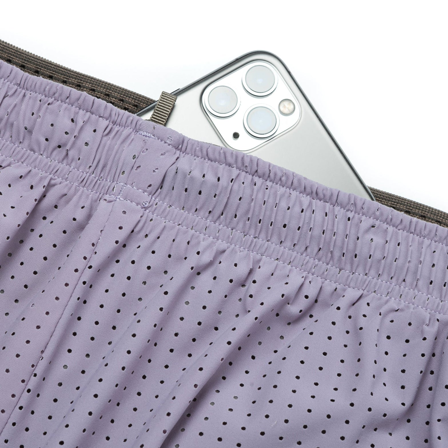 Satisfy Space-O™ 5 Inch Distance Shorts in Dusk — closeup showing sweat-resistant phone pocket hidden inside the double waistband construction