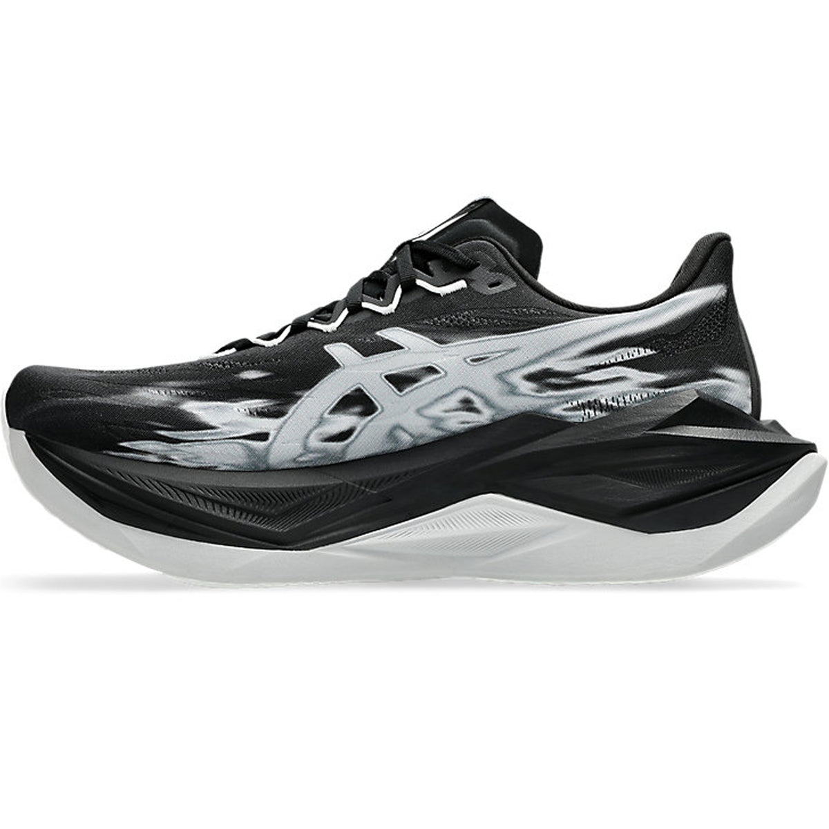 A black and white Asics Superblast 3 Running Shoe with a chunky sole and striking silver graphic accents along the side, shown from the left. Engineered with advanced FF LEAP foam technology for maximum cushioning, the Superblast 3 offers outstanding comfort and support with every stride.