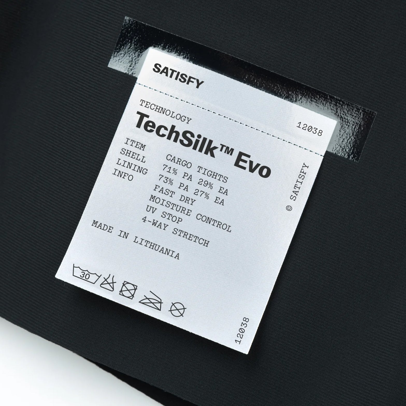Satisfy TechSilk Evo 9 Inch Half Tights Black close-up of fully detachable exterior care label with nothing inside interfering with skin contact