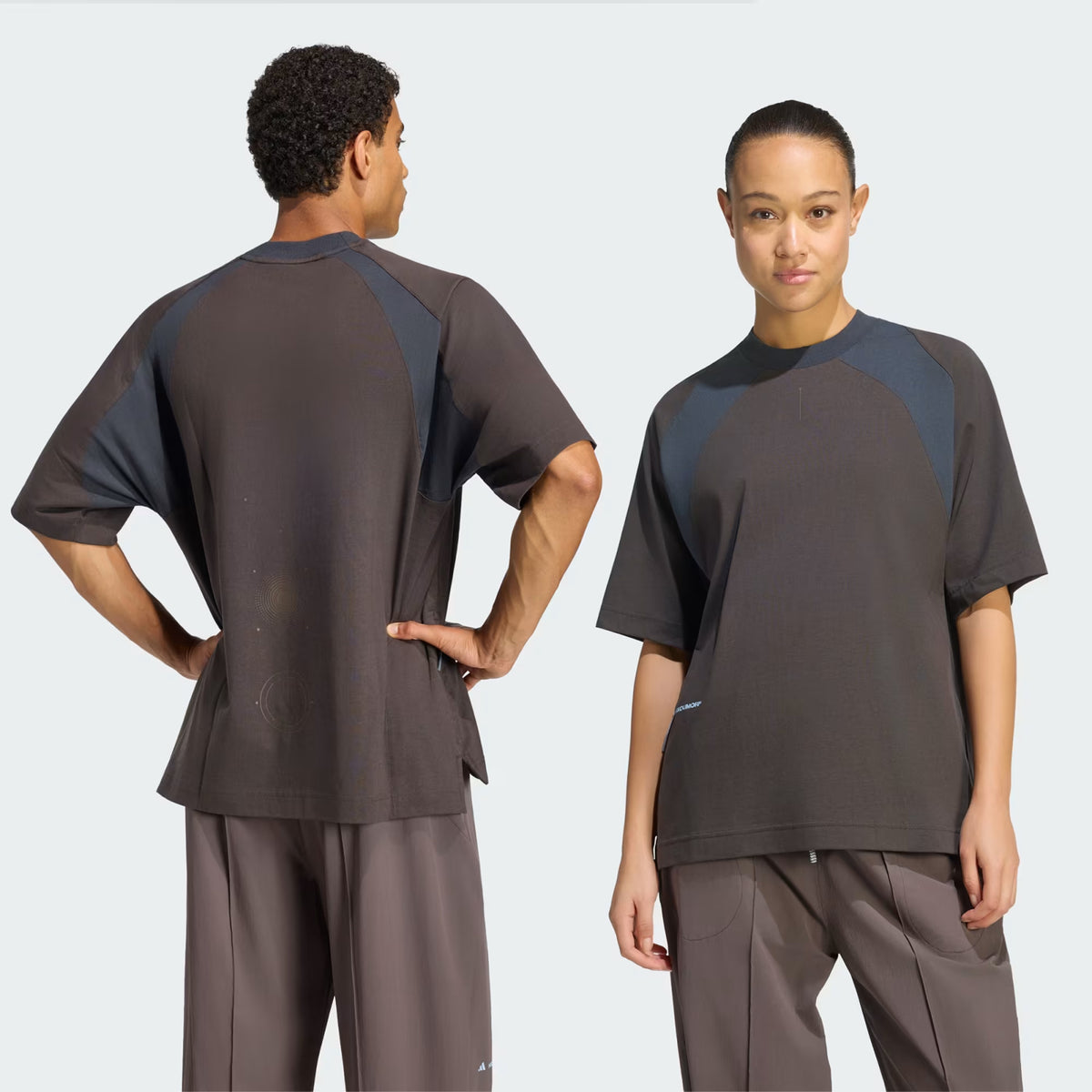 Front and back views of a person wearing a two-toned dark brown and grey Unisex H.Koumori Tee Night Brown / Night Grey adidas running tee with an all-gender fit.