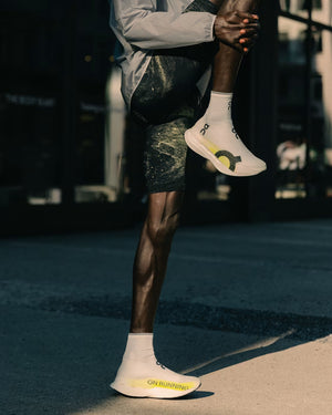 On Cloudboom Strike LS White / Lime - achilles heel