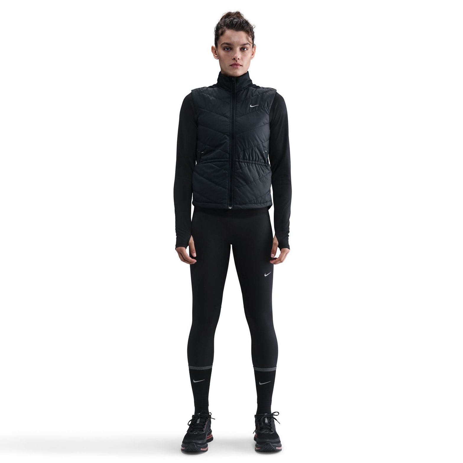 Nike Swift women's Therma-FIT insulated running vest front full body view on model showing tailored fit