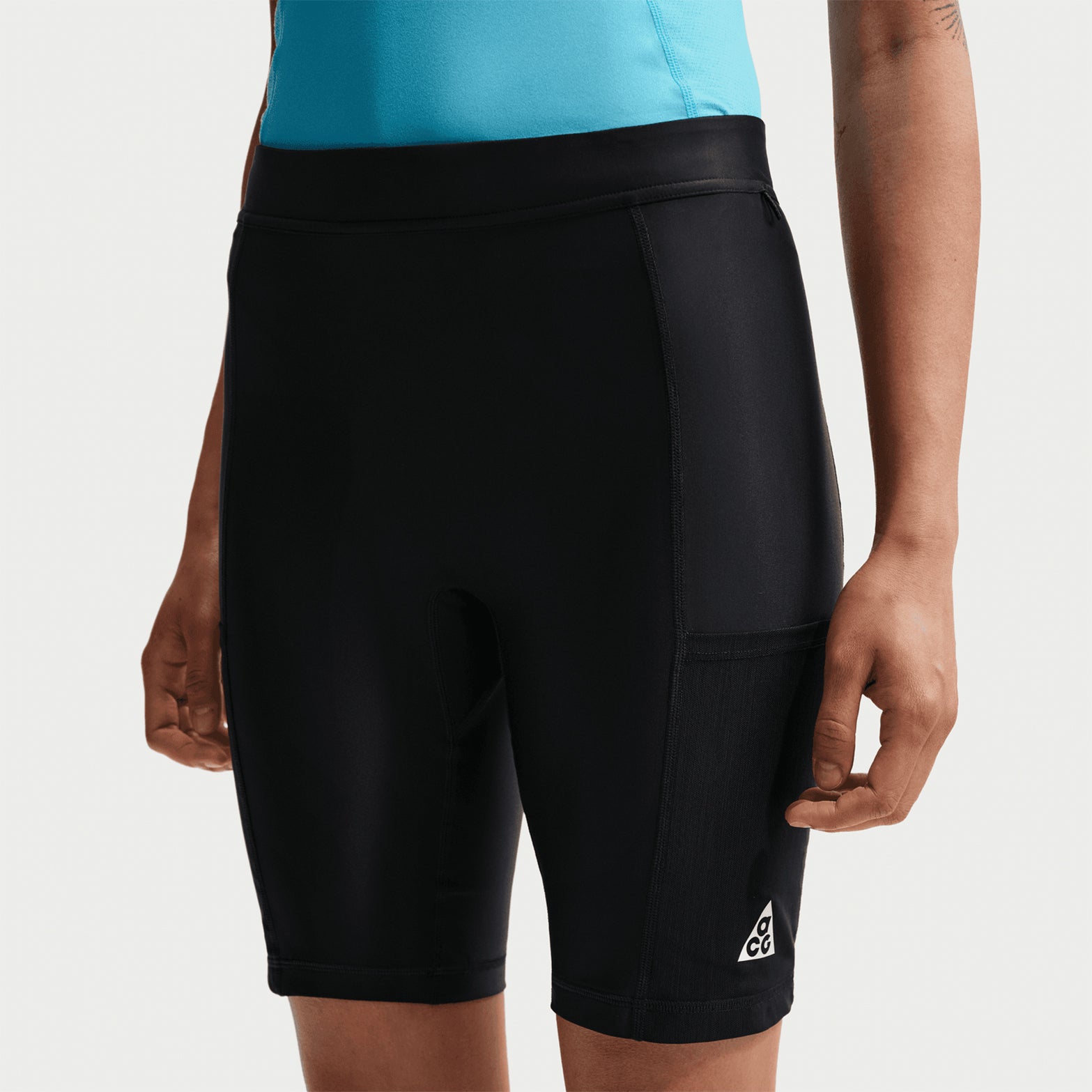 Women's Nike ACG Five Towers Skort Anthracite Summit White showing shorts configuration with skirt flap removed using side buttons and drop-in pockets on biker short