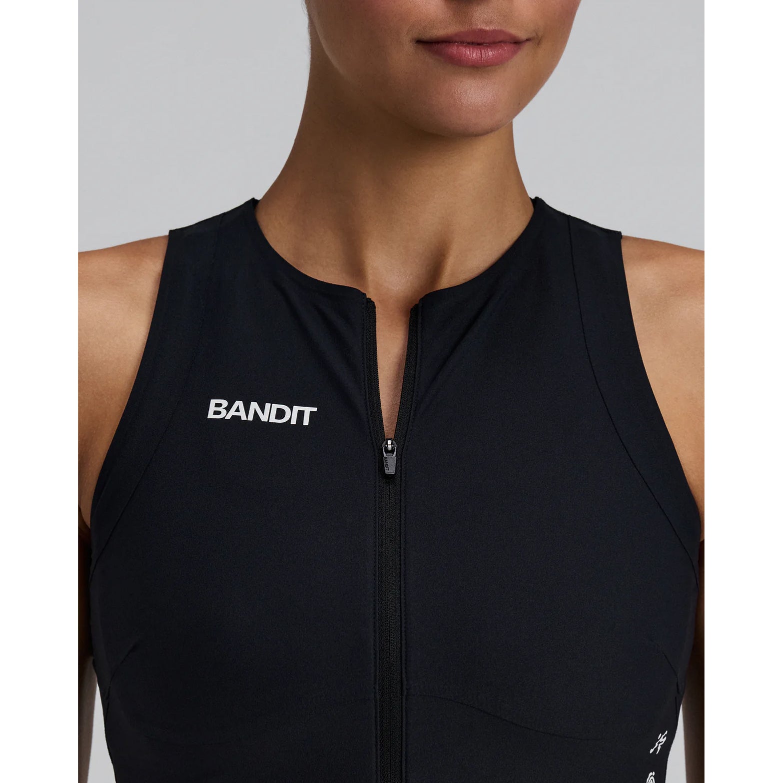 Women's Bandit Adapto Distance Race Top Black close-up front showing 2-way zipper for breathability control and ultra-light featherweight compression construction