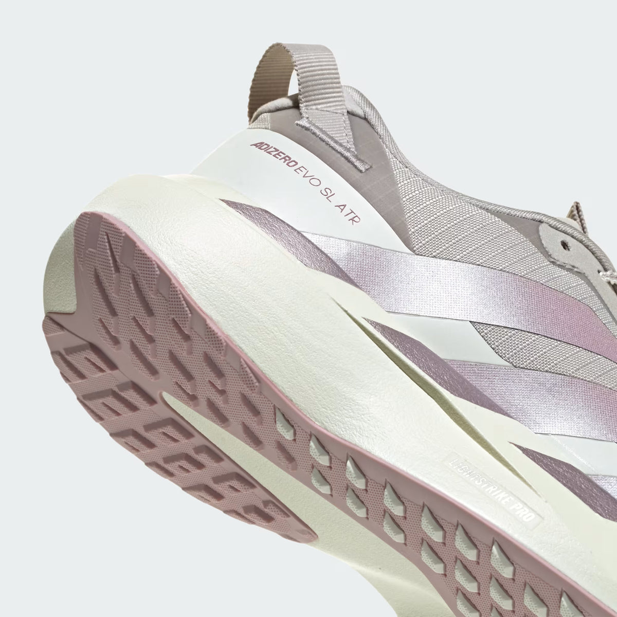 Women's adidas Adizero EVO SL ATR Running Shoes Grey One Ice Purple White Tint angled side and heel view showing LIGHTSTRIKE PRO super-light cushioning with Continental rubber 1.5mm lugs and ripstop mesh upper for versatile all-terrain speed