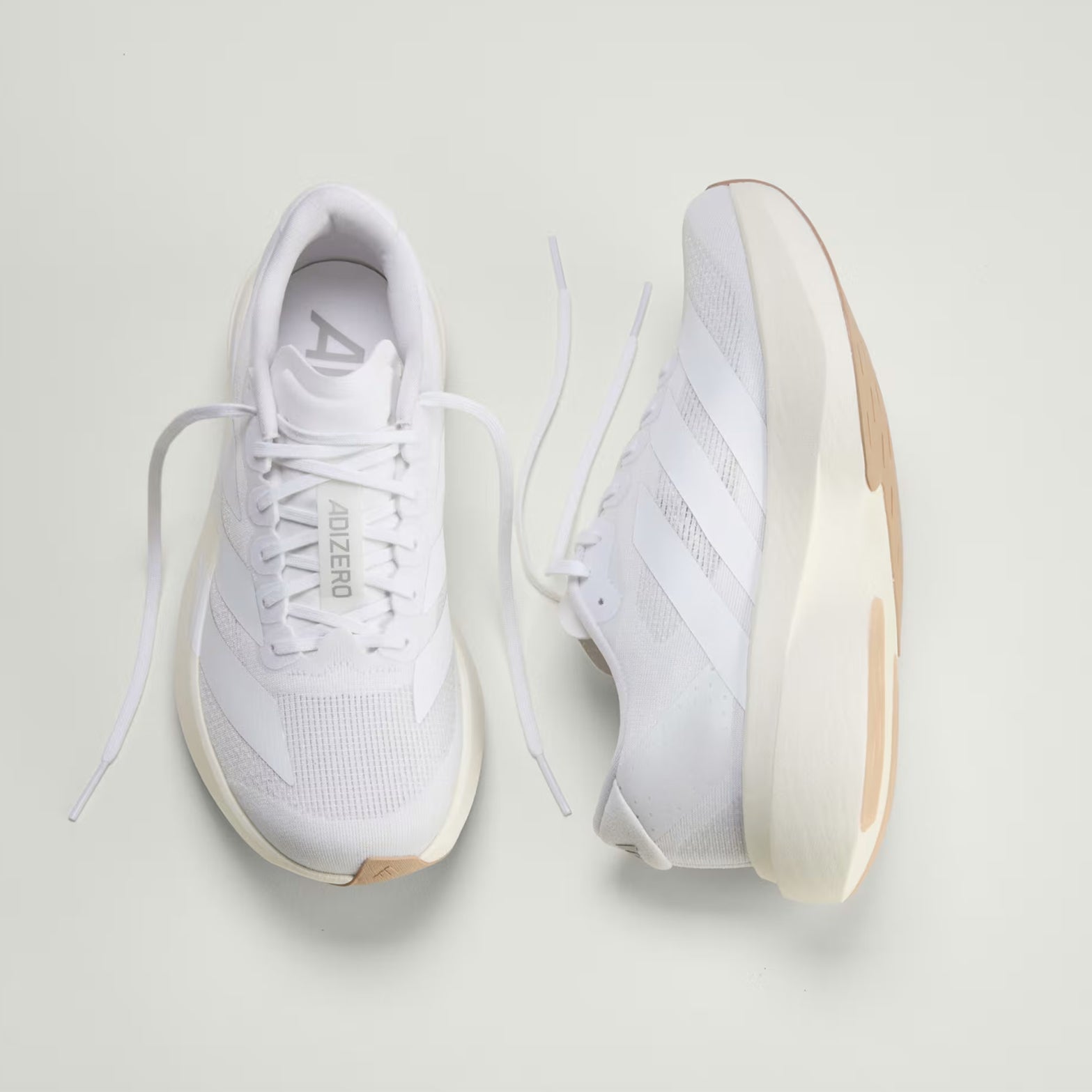 Women's adidas Adizero EVO SL Running Shoes Cloud White Cloud White Warm Sandstone top view showing synthetic and textile upper with racing-inspired aesthetic for versatile wear