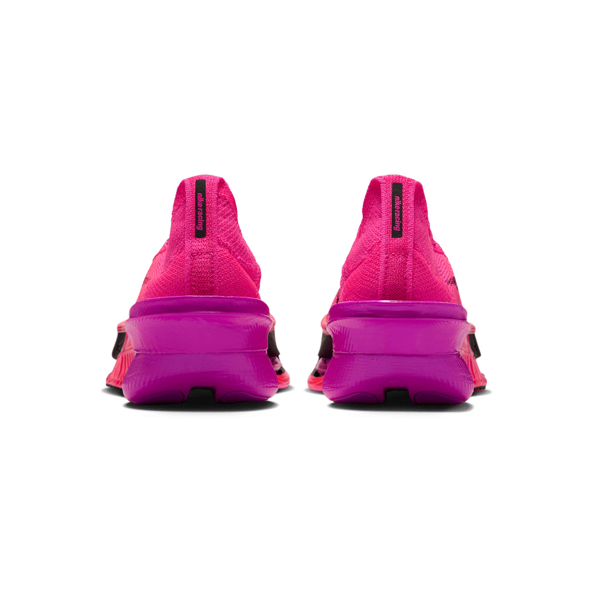 Back view of bright pink Women’s Alphafly 4 Running Shoes, featuring thick, prominent soles and black vertical tabs on the heels.