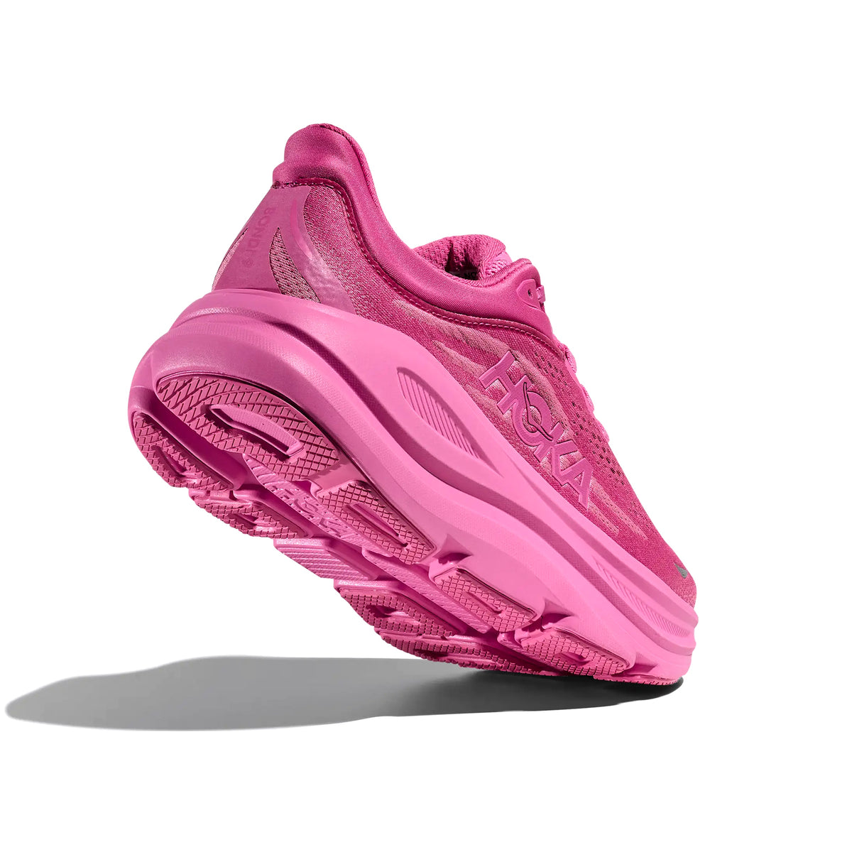 HOKA Bondi 9 women's running shoe in Crabapple / Crabapple — angled side view showing crabapple structured knit upper, MetaRocker heel geometry and super critical EVA foam midsole stack
