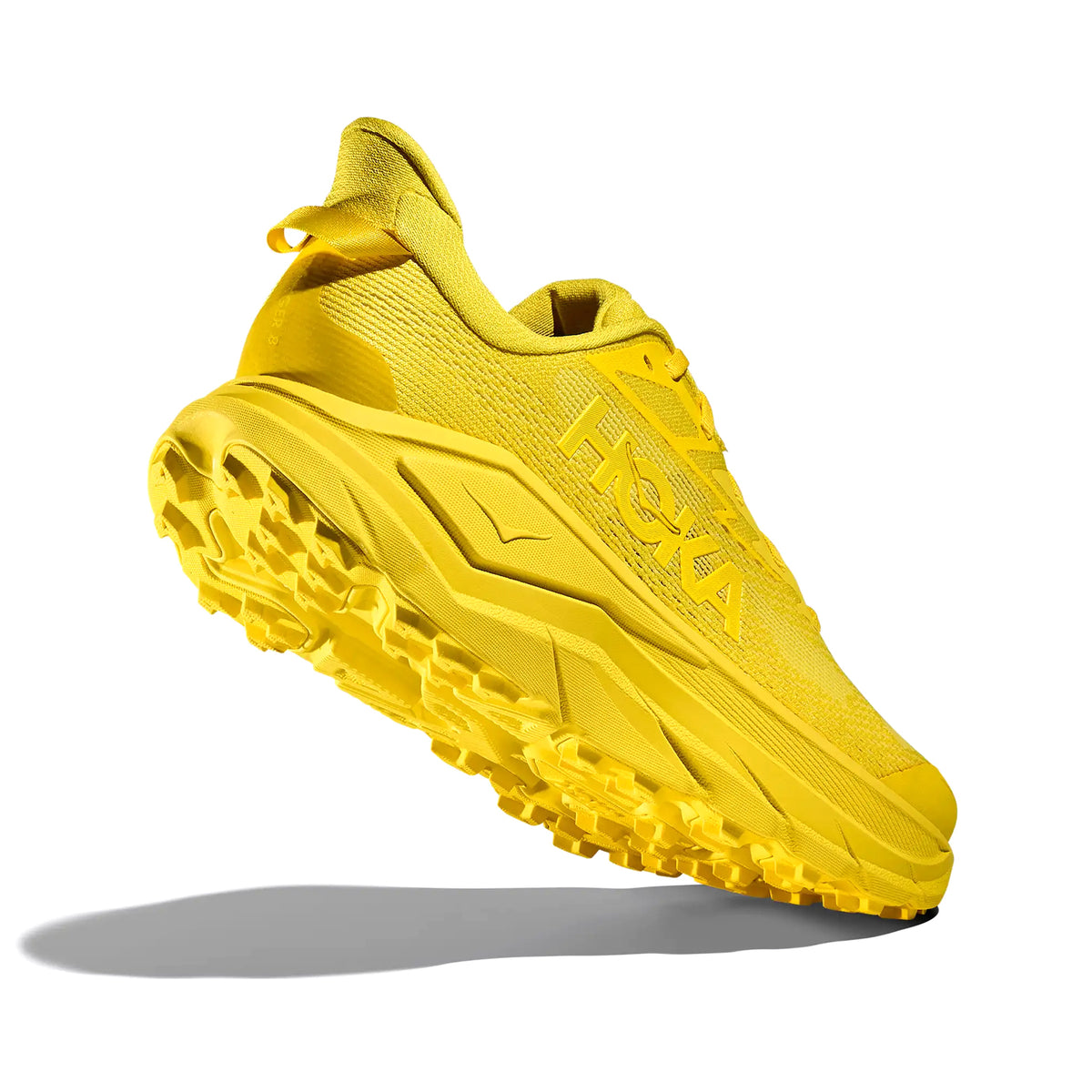 HOKA Challenger 8 women's running shoe in Electric Lemon / Electric Lemon — angled side view showing electric lemon rPET engineered mesh upper, 3D screen-printed toe cap and compression moulded EVA midsole stack with multi-directional lug outsole