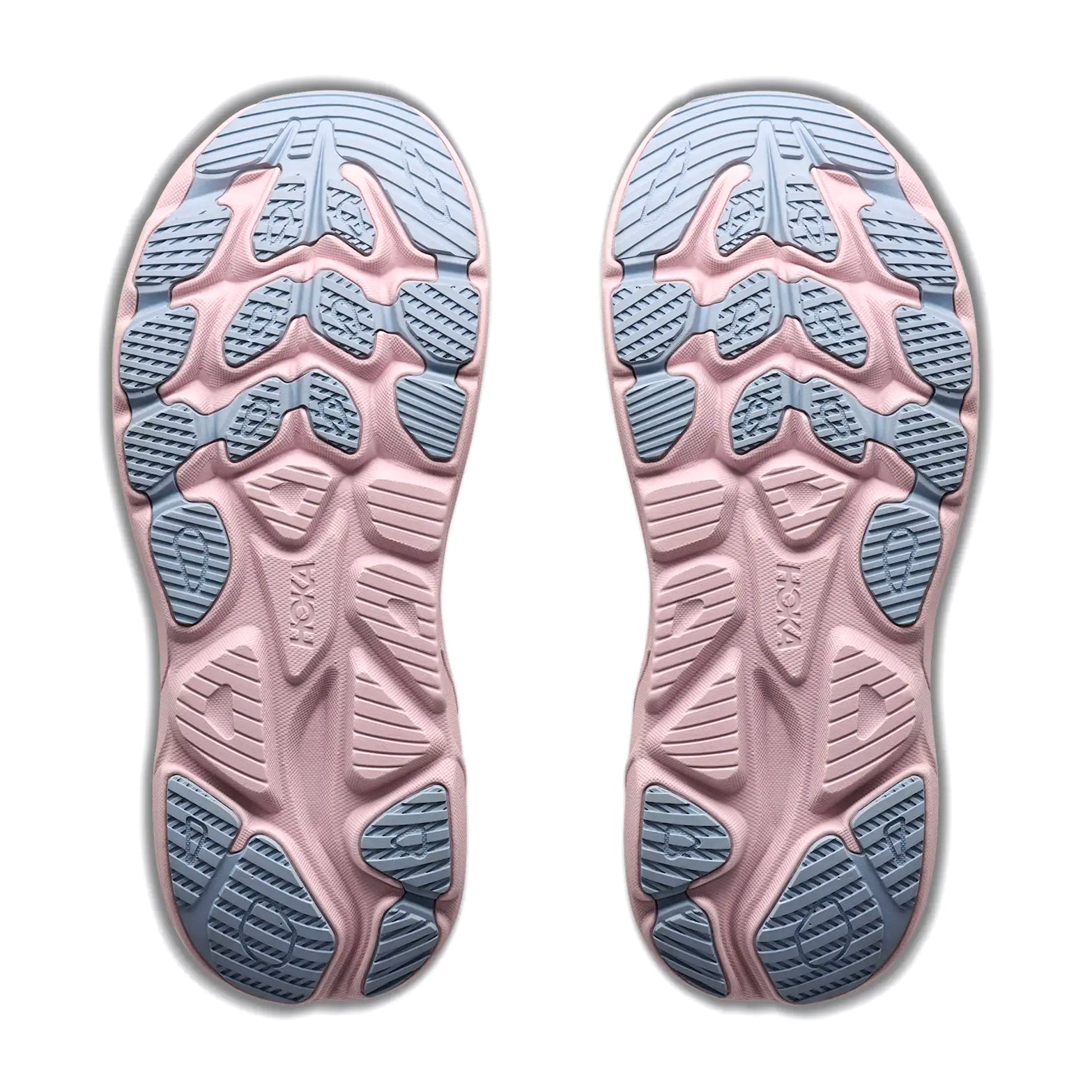 Two sneaker soles from the Hoka Women’s Clifton 11 Glimmers GORE-TEX Running Shoes in Alabaster / Pink Opal are shown side by side on a white background. The soles have a pink base with blue rubber tread patterns, featuring a geometric grip design and EVA cushioning for enhanced comfort, with the Hoka brand name visible on both.