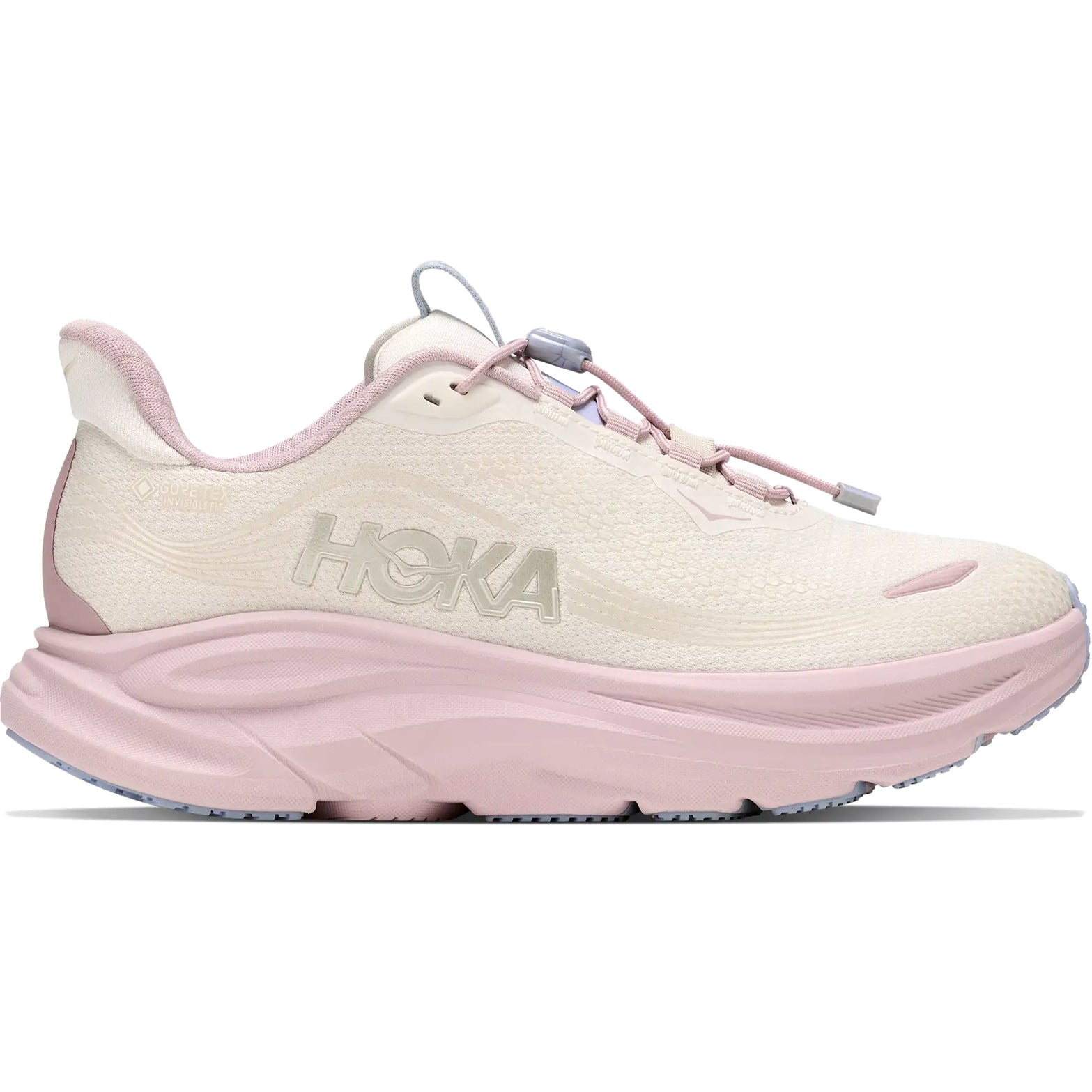 A light pink and cream athletic shoe featuring a thick, cushioned EVA sole, breathable mesh upper, and lace-up closure is shown from the side. The HOKA logo is visible on the side of the shoe, indicating it as the Women’s Clifton 11 Glimmers GORE-TEX Running Shoe in Alabaster / Pink Opal—an ideal choice for those seeking comfort and support.