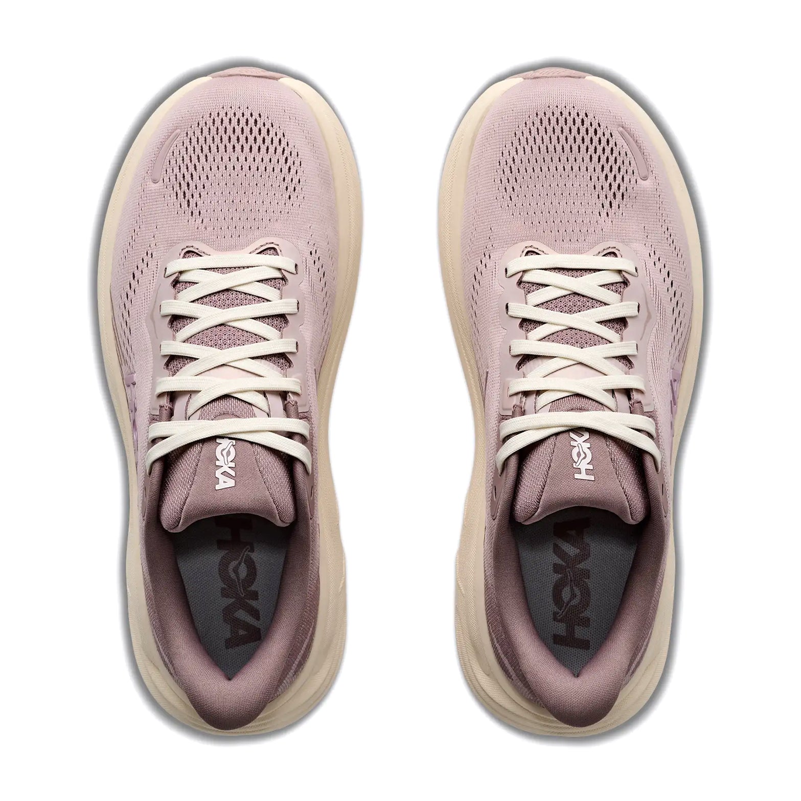 A pair of Hoka Women’s Clifton 11 Glimmers Running Shoes in Pink Opal / Quartzite, viewed from above, featuring white laces, breathable mesh uppers, beige soles, and a cushioning layer of compression moulded foam.