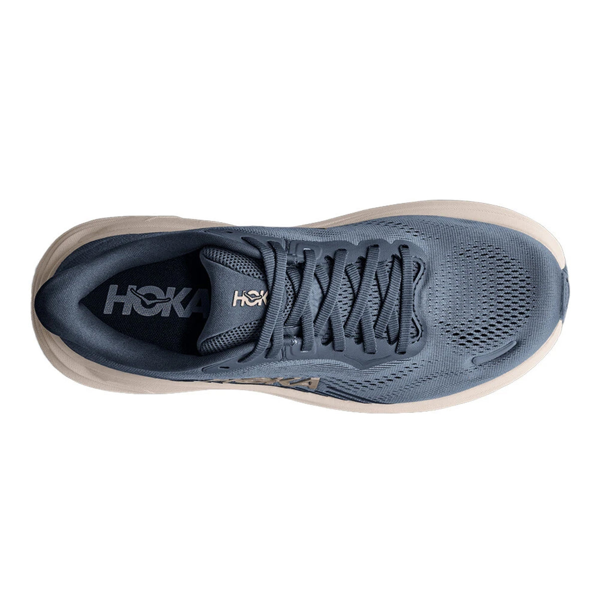Top-down view of a dark blue Women’s Clifton 11 Running Shoes Faded Navy / Slate Blue with a thick, tan compression moulded EVA foam sole.