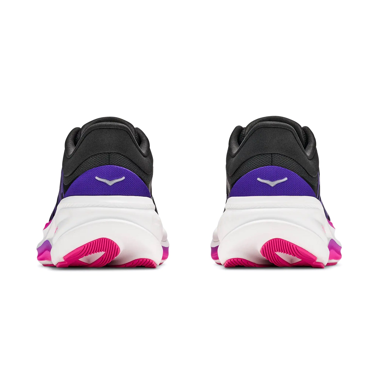 Rear view of a pair of Hoka Women’s Clifton Pro Running Shoes in Carbon Black and Cosmic Purple, showcasing black, purple, and white uppers, white midsoles, and pink outsoles. Both sneakers display a small white logo on the heel tab, echoing the streamlined design characteristic of HOKA Clifton Pro models.