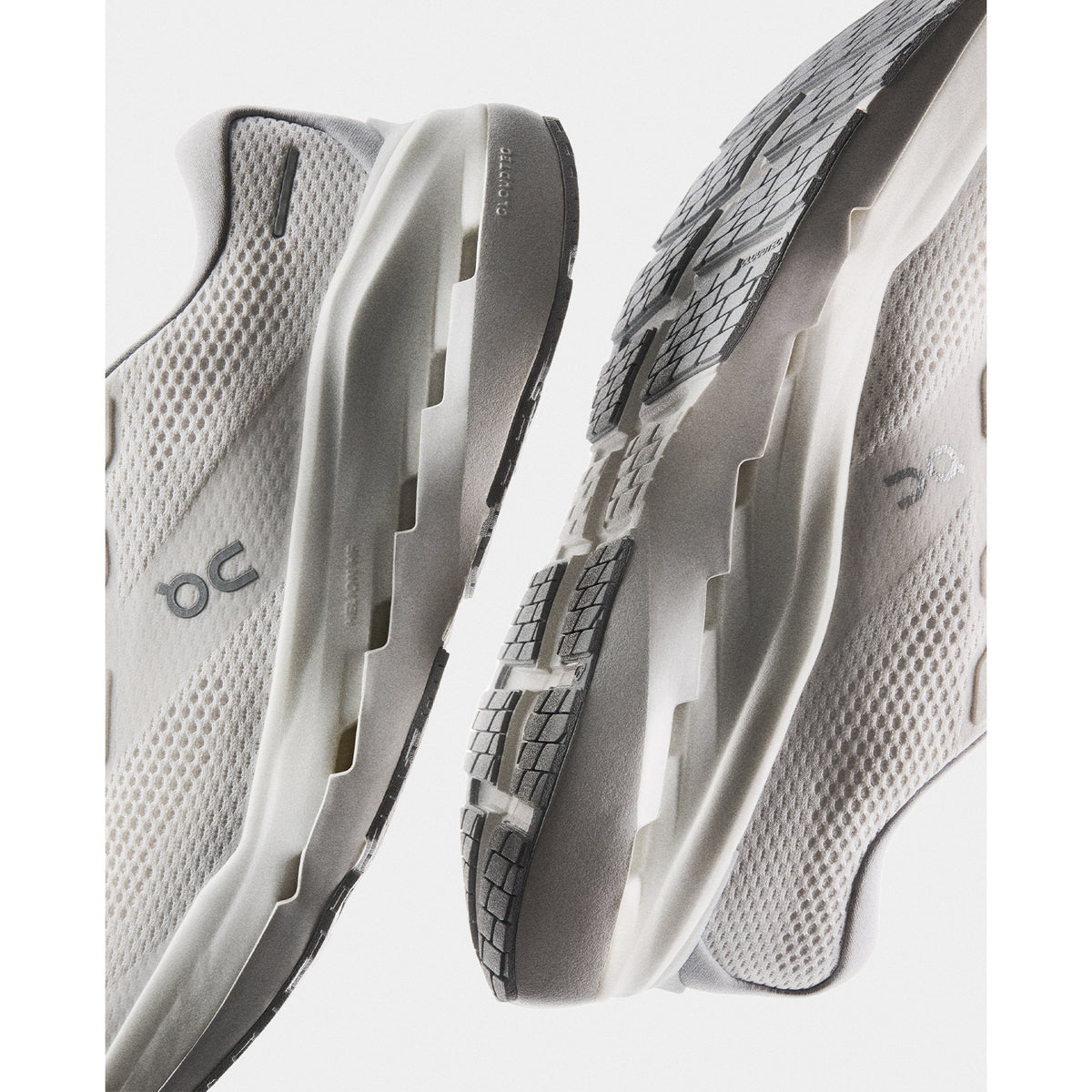 Women's On Cloudrunner 3 Max Running Shoes White Glacier angled side and heel view showing stability-engineered CloudTec with Helion HF hyper foam, wide base and high sidewall cupping for fluid balanced daily road running