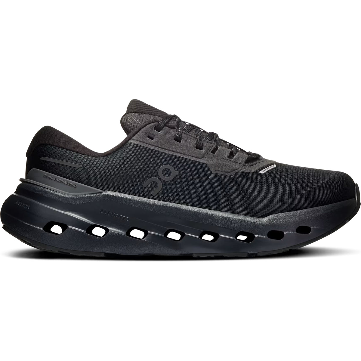 The Women’s Cloudrunner 3 Waterproof Running Shoes in Black by On feature a thick, cushioned sole with oval cutouts and a lace-up design. This stability shoe has a minimalist look with subtle On branding on the side.