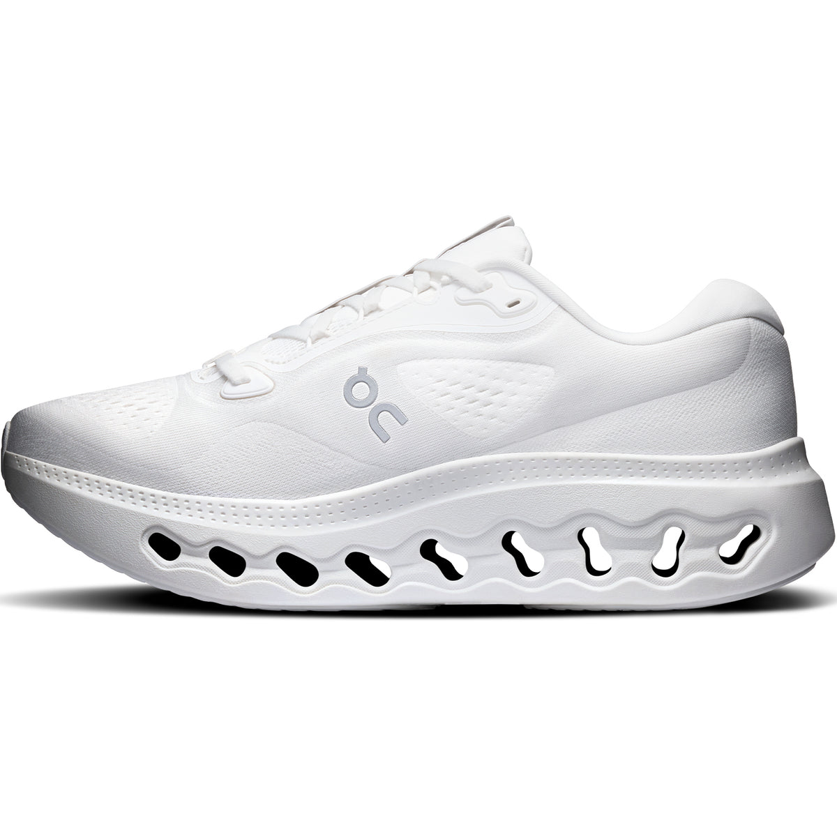 Women’s Cloudsurfer 3 Running Shoes White / White with a thick, hollowed-out midsole featuring a series of oval cutouts.