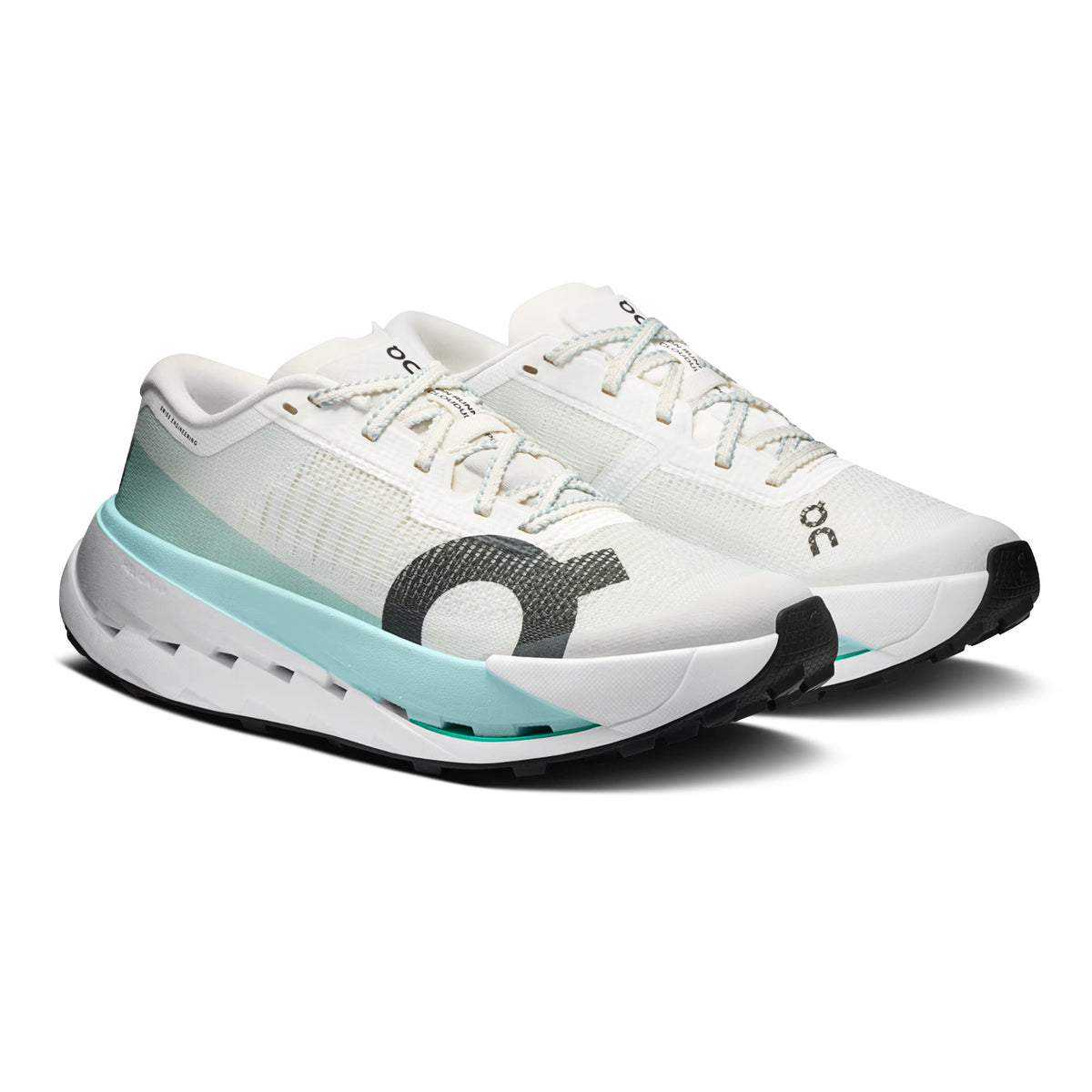Women's On Cloudultra Pro Trail Running Shoes Ivory Celeste angled side and heel view showing Helion HF hyperfoam dual midsole with MissionGrip outsole and zoned Leno weave upper for elite-level ultra-trail endurance performance