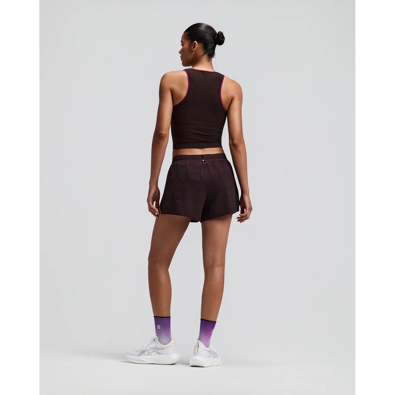 Women's Bandit CoolGrid 3 Inch Split Shorts Espresso back full body view on female runner showing split design with reflective centre back branding and CoolGrid breathable construction