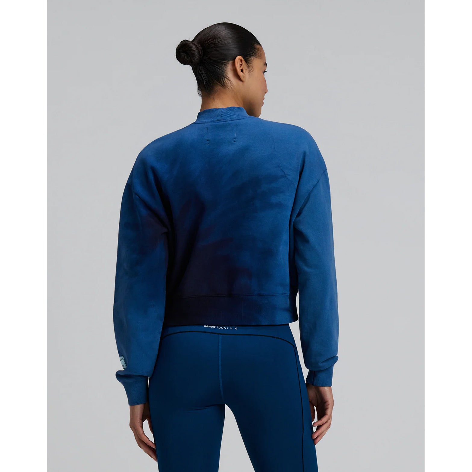 Bandit Cropmock Pullover women's in Aegean Blue Wave Print — back view worn on model showing cropped silhouette, aegean blue wave print variation and embroidered Bandit back hem branding