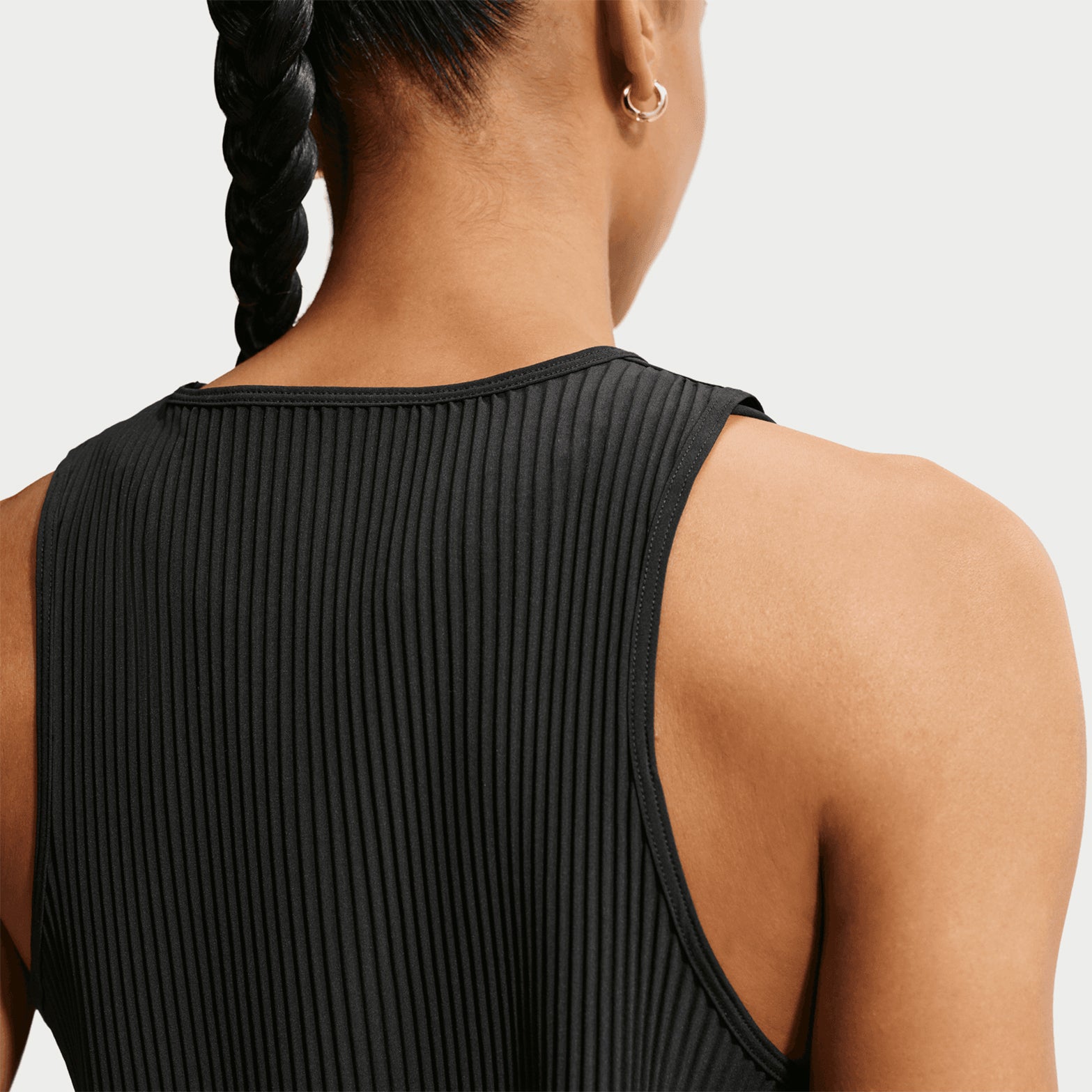 Women's Nike Dri-FIT Aeroswift ADV Cropped Running Tank Black White back view on female runner showing cropped construction with advanced sweat-wicking technology for racing and training