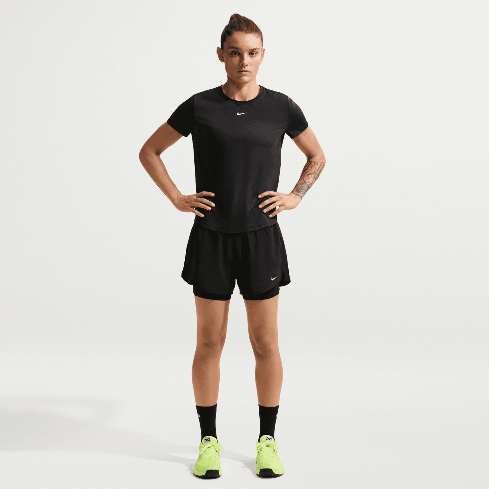 Women's Nike Dri-FIT High-Waisted 3 Inch 2-in-1 Shorts Black White full body front view on female model showing 2-in-1 construction with waistband pockets